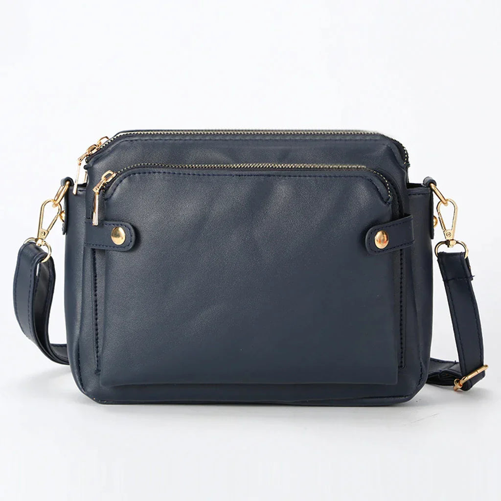 Tara's Multifunktionale Lederschultertasche & Clutch