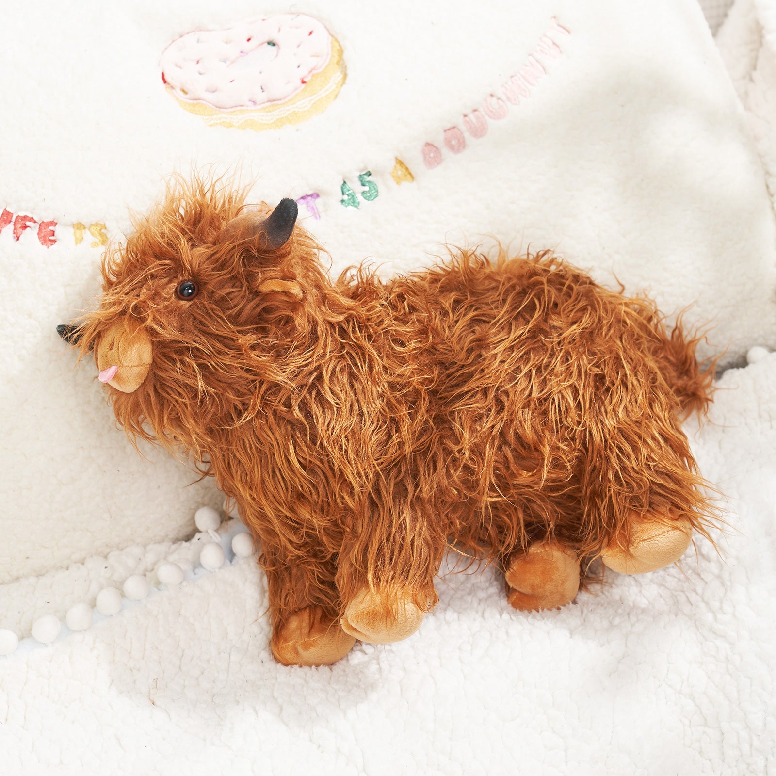 CuddleCoo™ – Realistisches Hochlandrind-Design