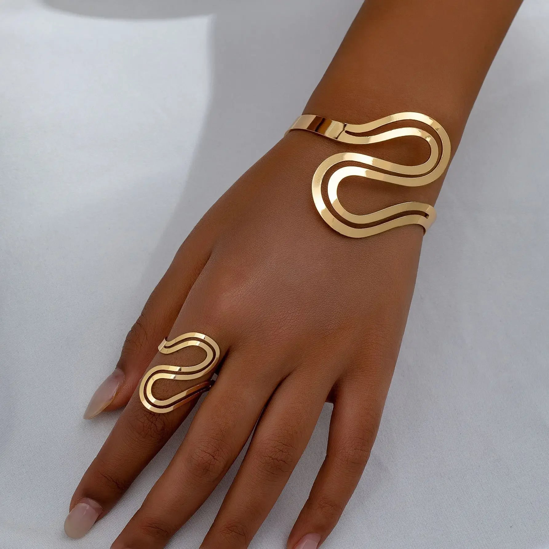 2er Set aus vergoldetem Armband und Ring in Schlangenform